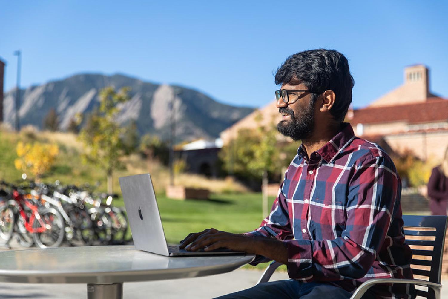 Indian man working on campus