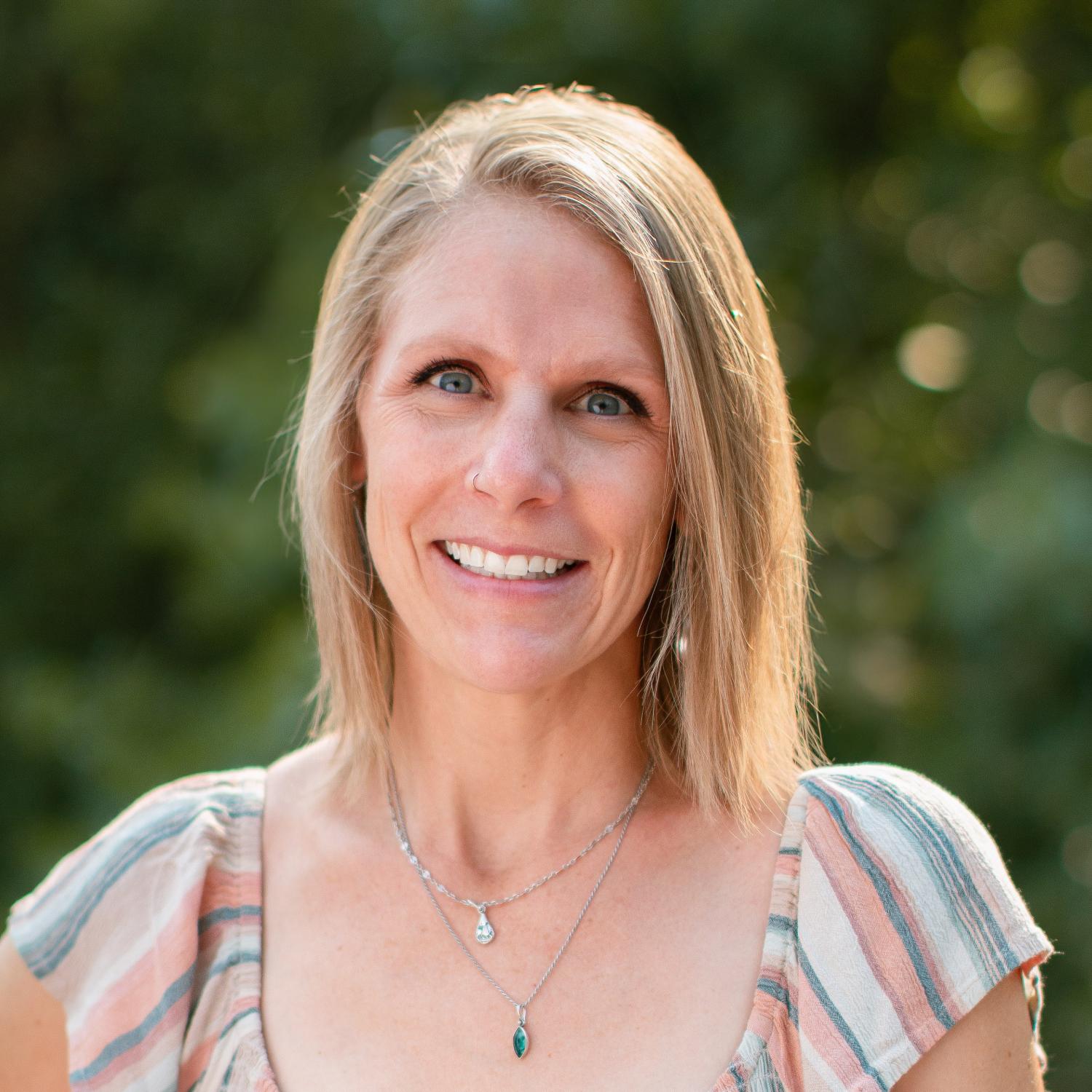 Portrait of Aimee Santistevan.