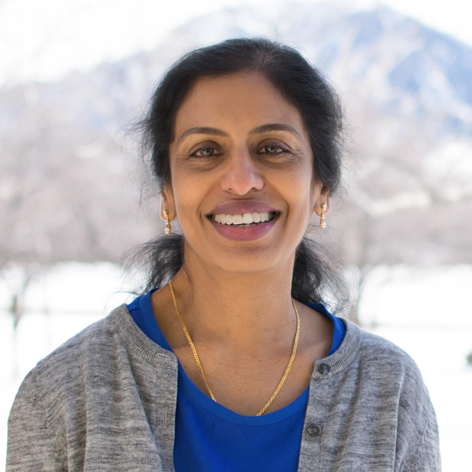 Portrait of Meena Palaniappan.